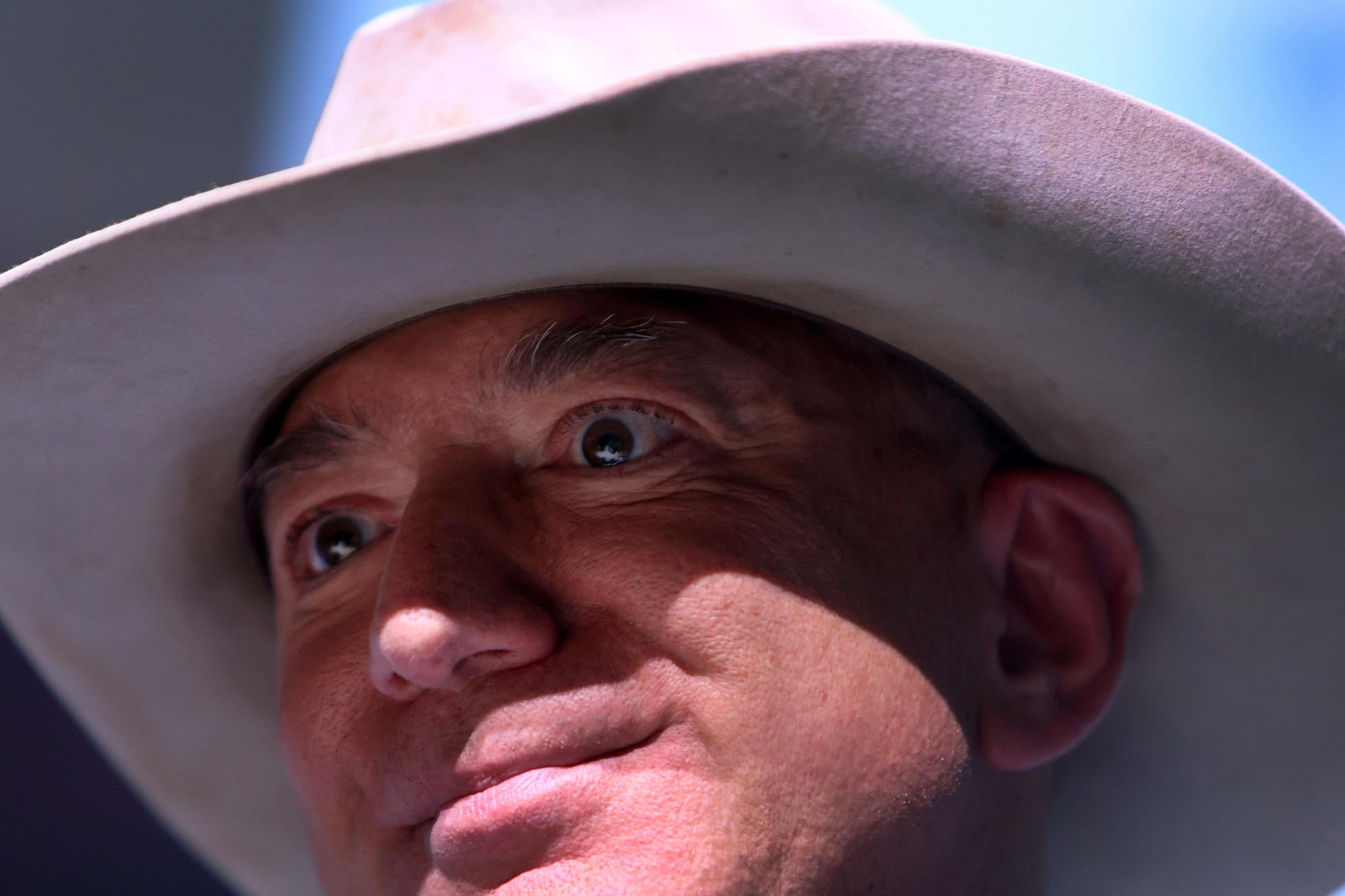 An extreme close-up of Jeff Bezos with his eyes very wide open.