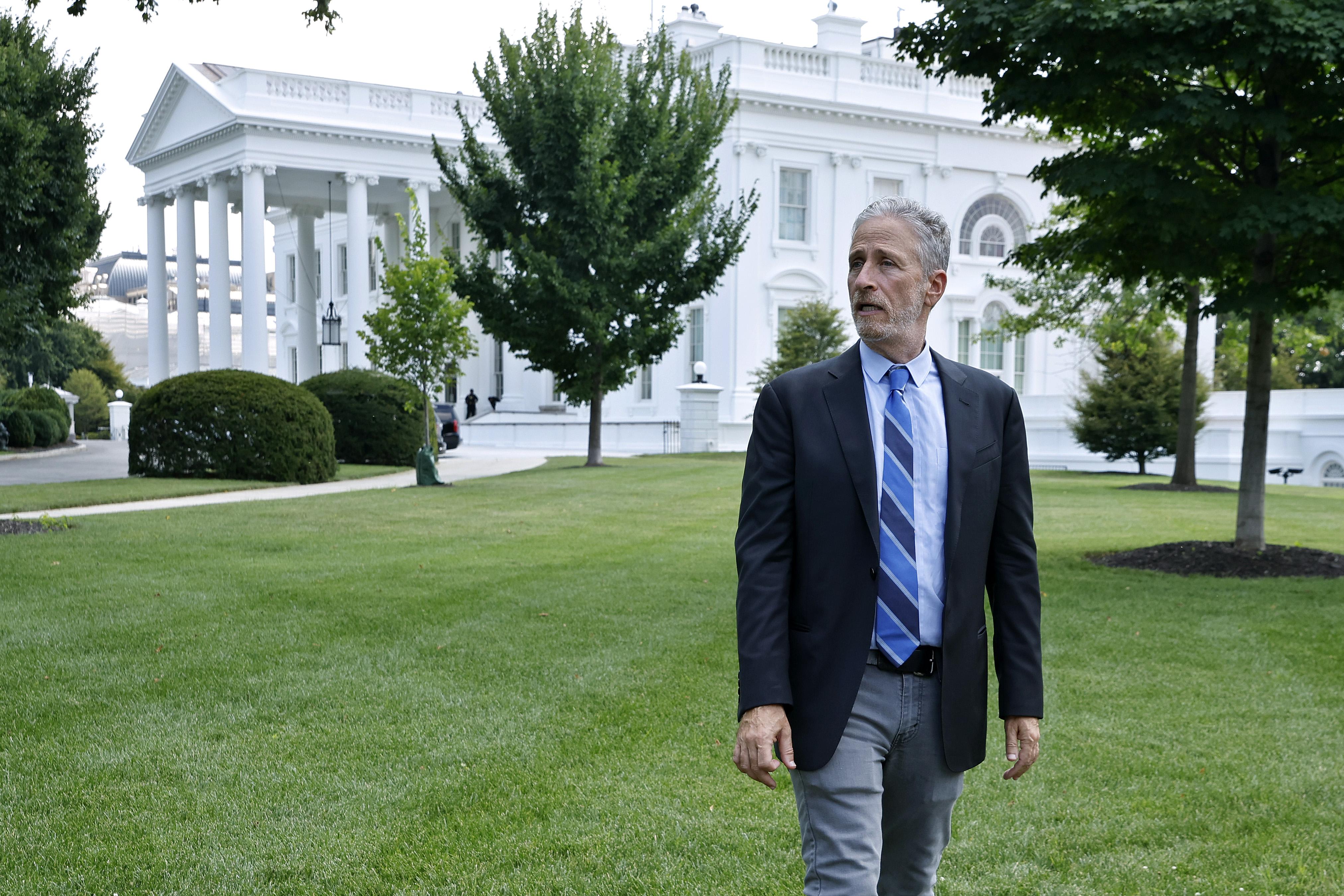 Jon Stewart walking near the White House
