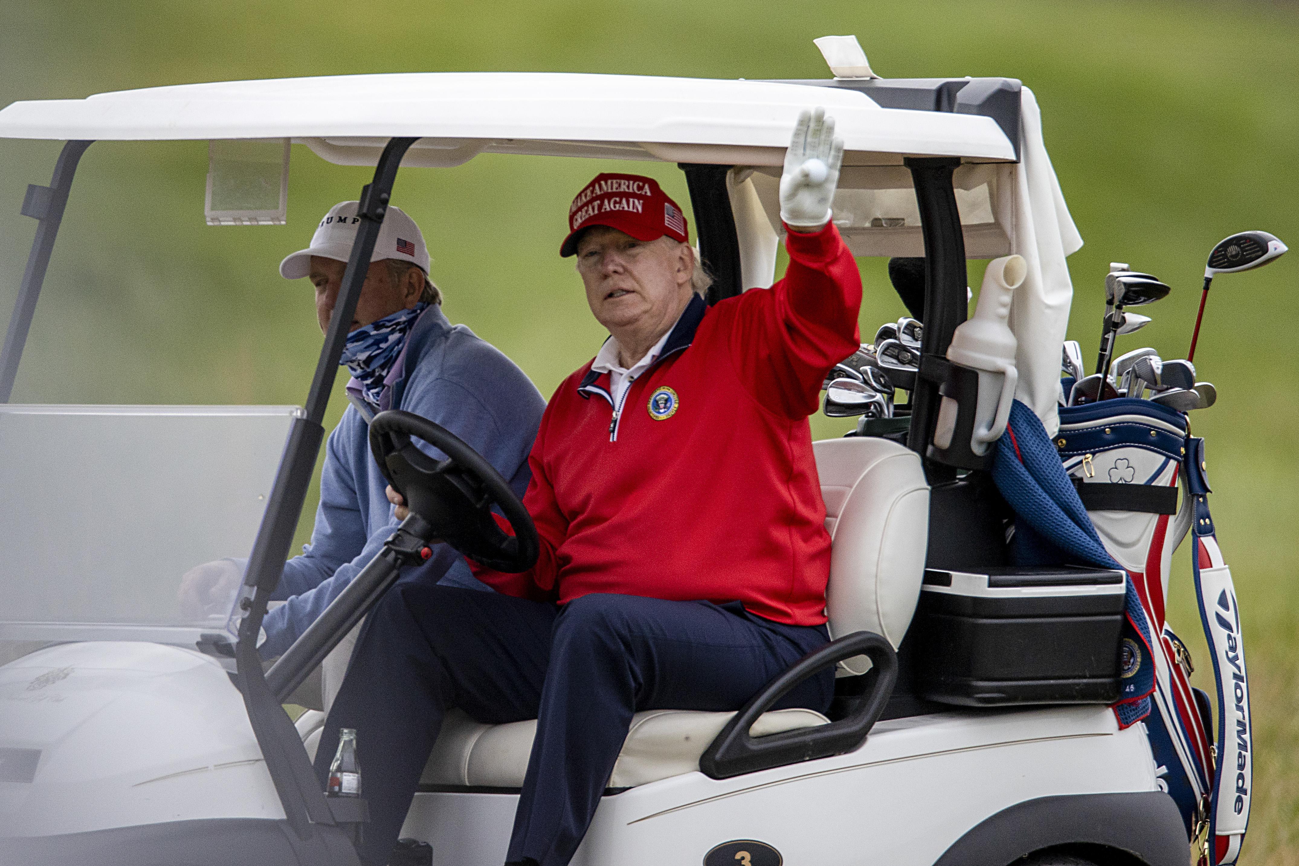 President Donald Trump golfs at Trump National Golf Club on November 27, 2020 in Sterling, Virginia. 