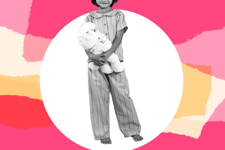 Girl in pajamas holding a stuffed animal.