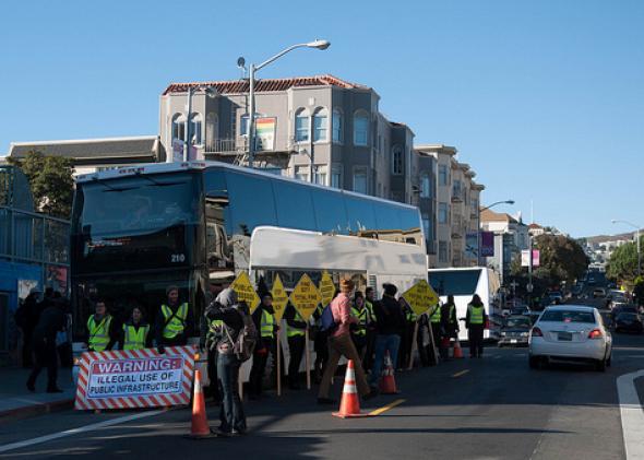 Protesters block a Google bus in San Francisco's Mission District in December. 