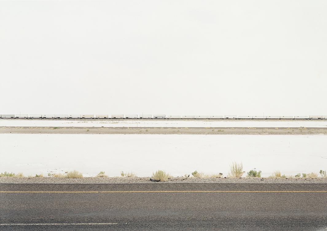 Untitled (White Trains on Salt Flats, I-80) Great Salt Lake Desert, Utah, 2002.