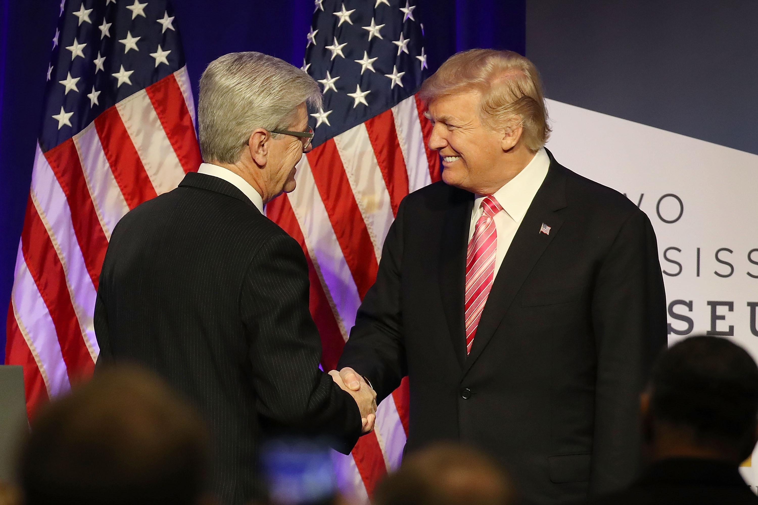 JACKSON, MS - DECEMBER 09:  President Donald Trump is introduced by  Mississippi Governor Phil Bryant to speak after touring the Mississippi Civil Rights Museum on December 9, 2017 in Jackson, Mississippi. The museum had a grand opening event with hopes to promote a greater understanding of the Mississippi Civil Rights Movement and its impact by highlighting the strength and sacrifices of its people.  (Photo by Joe Raedle/Getty Images)