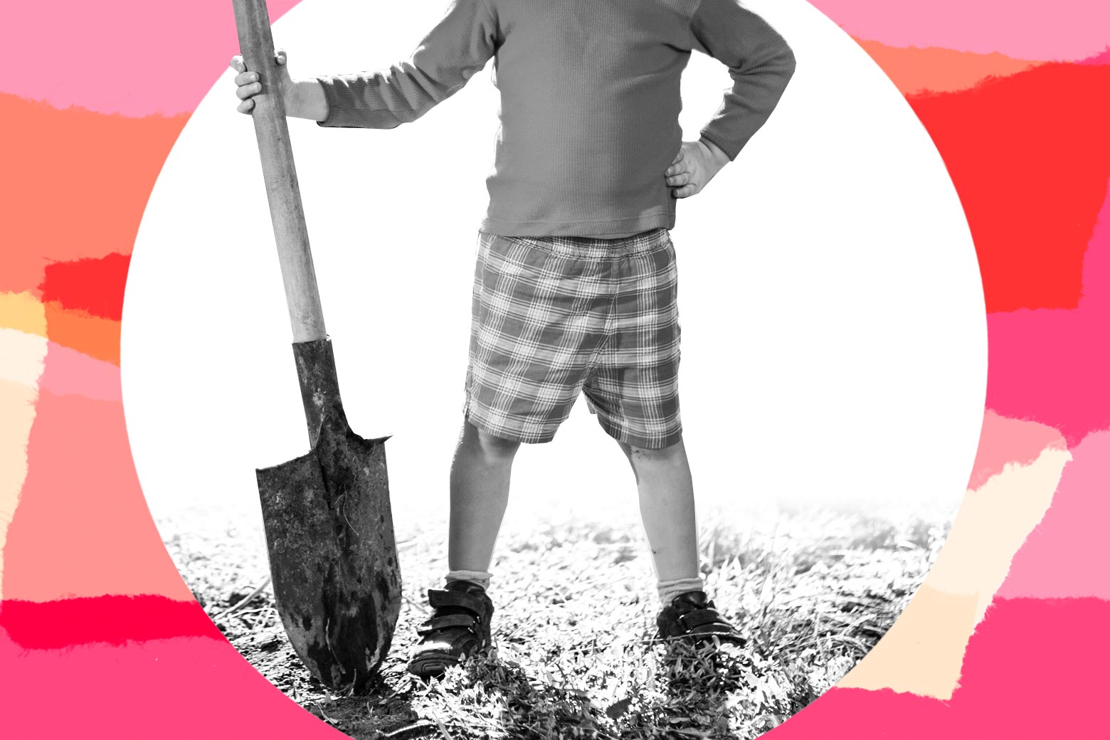 Girl proudly holding a shovel in the dirt.