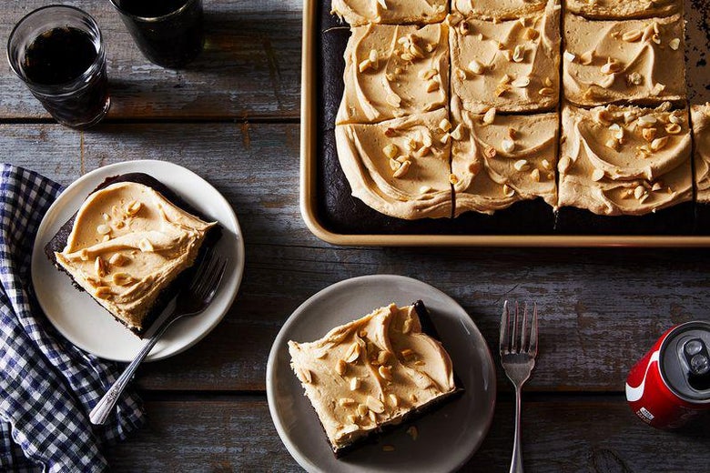 Slices of coke and peanut butter cake ready to be served.