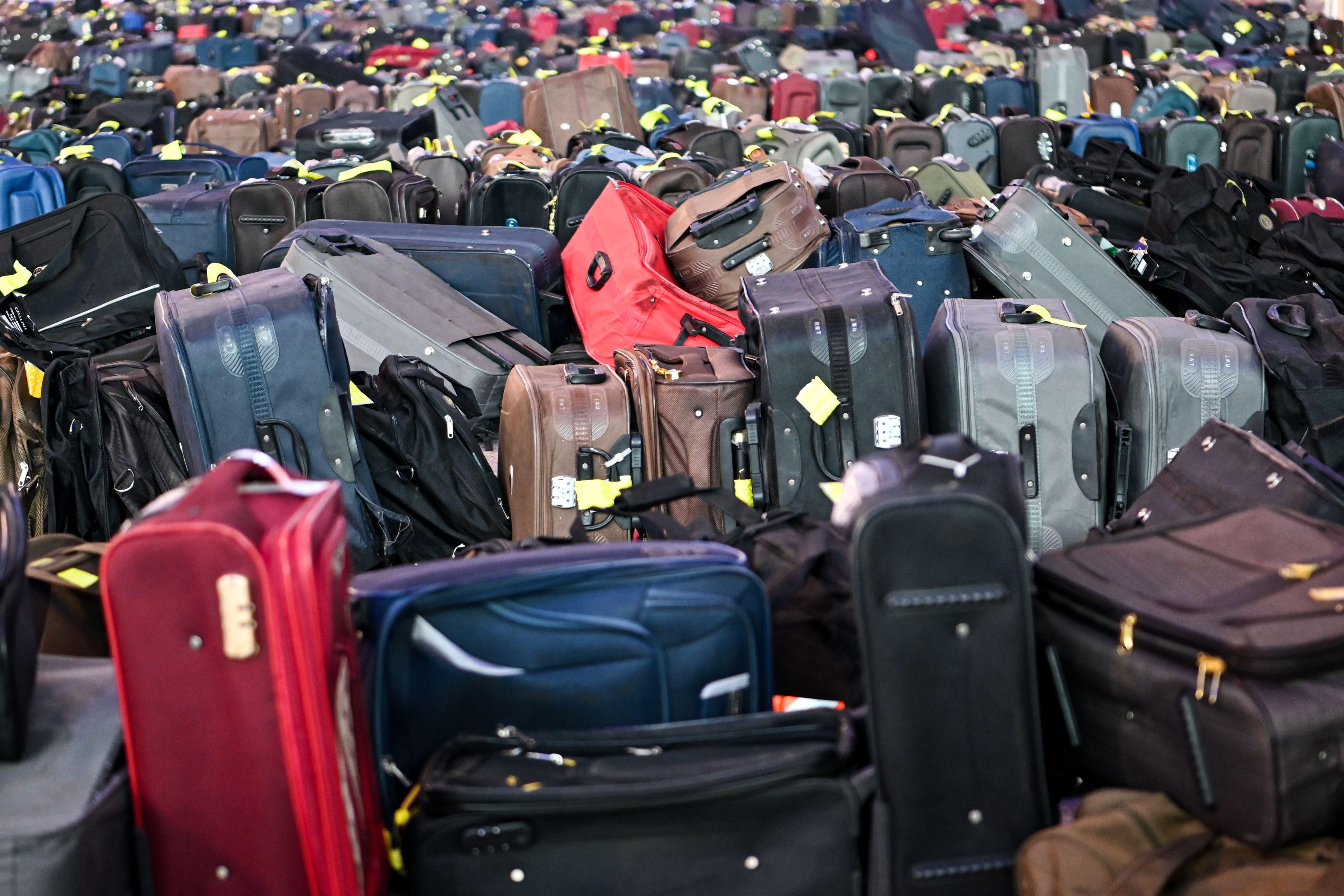 A large pile of suitcases