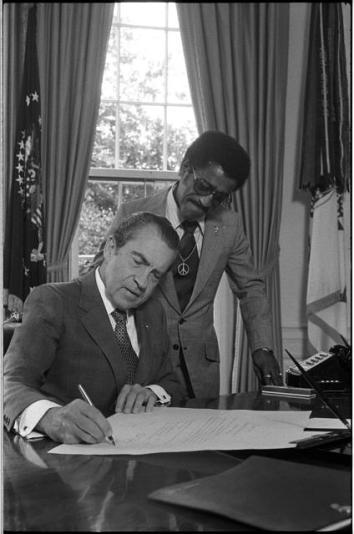 Pres. Nixon with Sammy Davis, Jr., new member of National Advisory Council on Economic Opportunity, July, 1971.