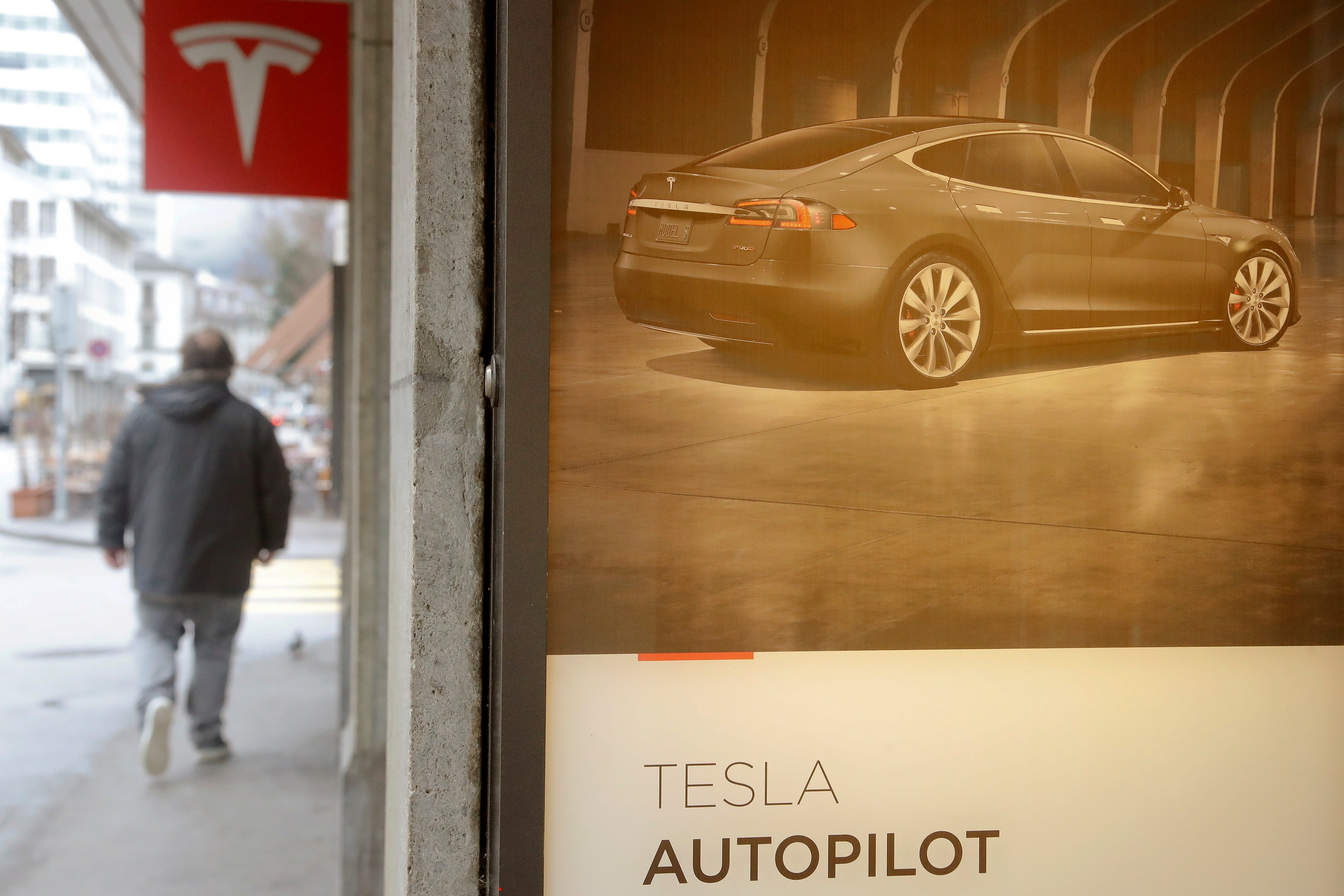 An advertisement for Tesla's autopilot.