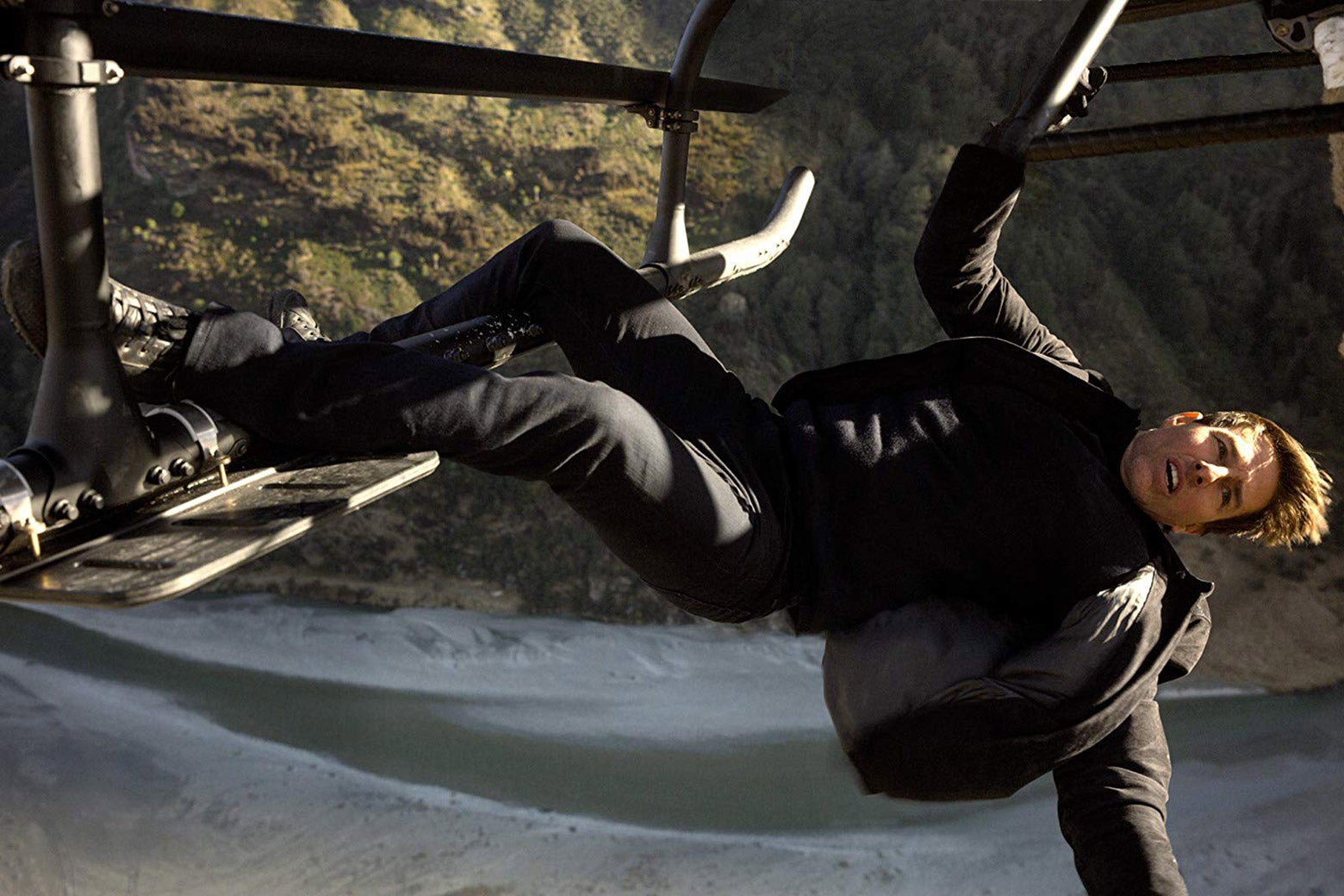 Tom Cruise hangs from a helicopter in Mission: Impossible—Fallout.