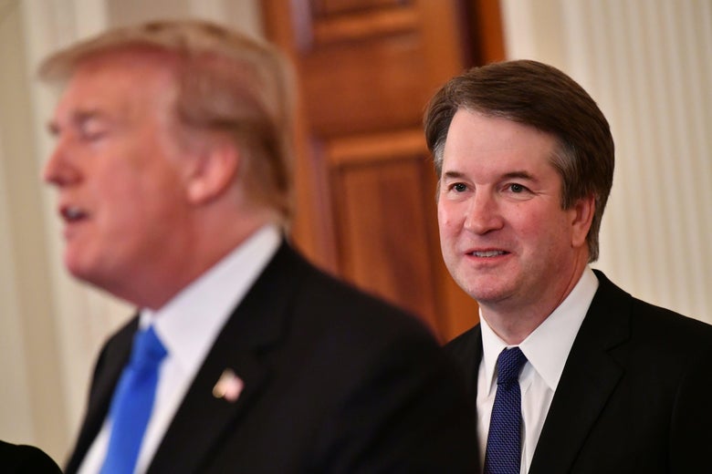 Supreme Court nominee Brett Kavanaugh listens to U.S. President Donald Trump announcing his nomination in the East Room of the White House on July 9, 2018 in Washington, DC. (Photo by MANDEL NGAN / AFP)        (Photo credit should read MANDEL NGAN/AFP/Getty Images)