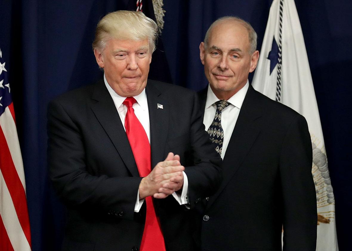U.S. President Donald Trump is joined by Homeland Security Secretary John Kelly during a visit to the Department of Homeland Security January 25, 2017 in Washington, DC. 