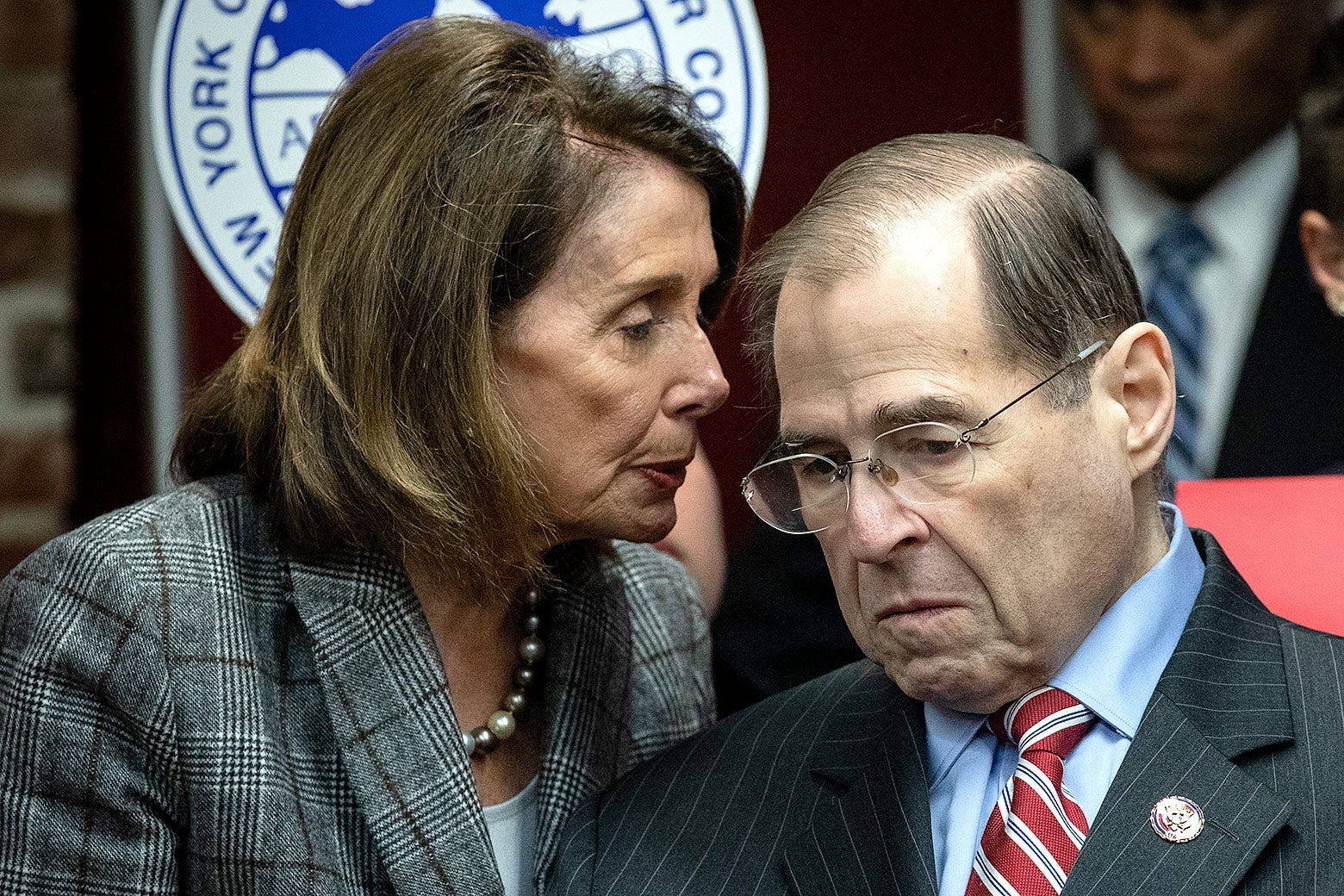 Nancy Pelosi speaks with Jerrold Nadler.