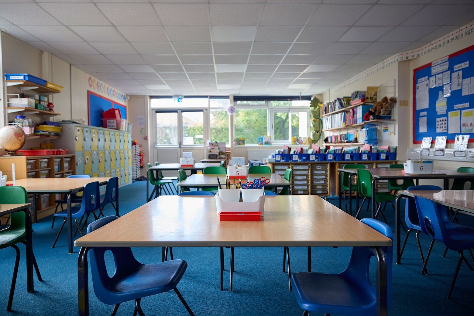 A nice, clean, and well-organized elementary classroom waits empty.