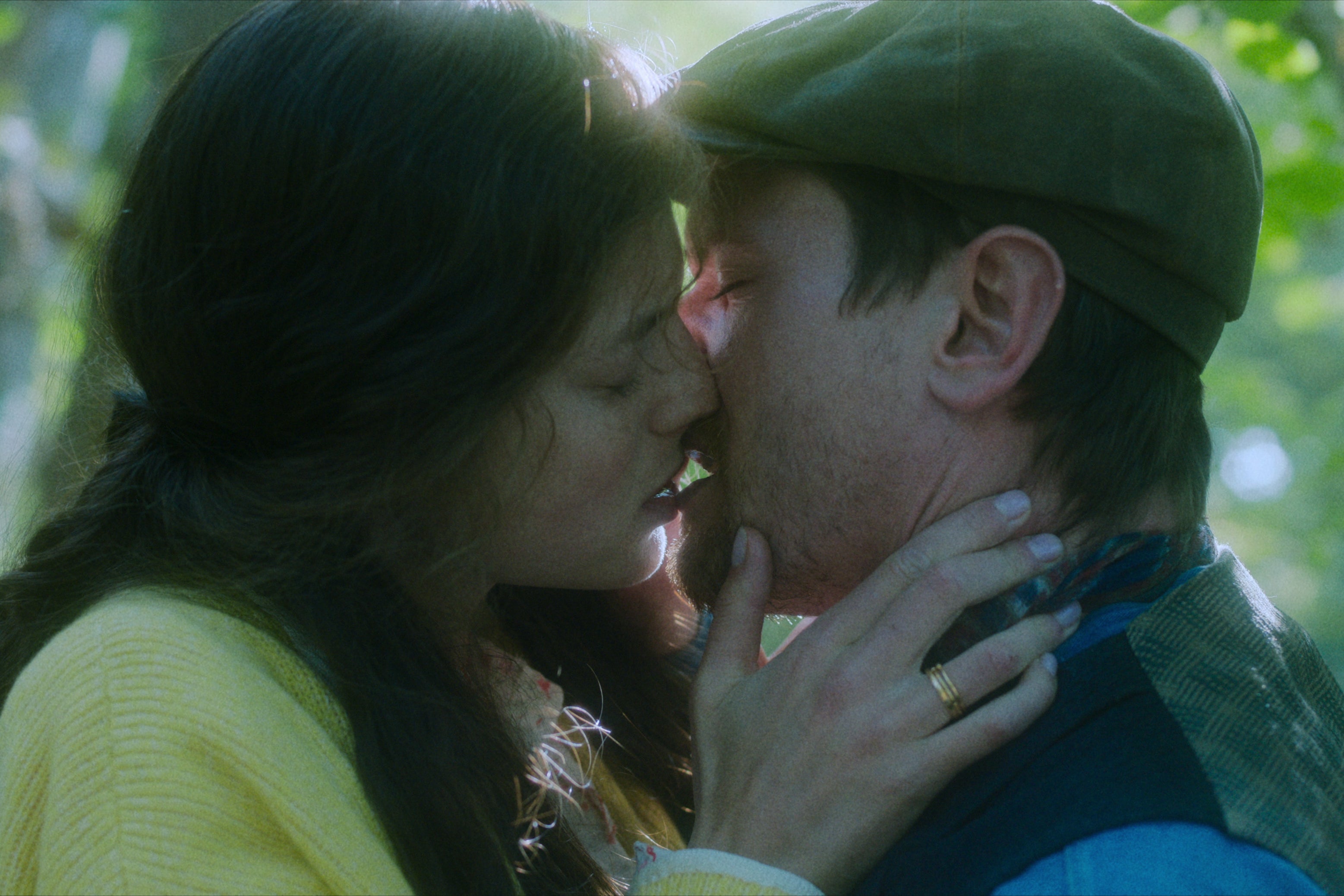 More smooching, this time in the woods