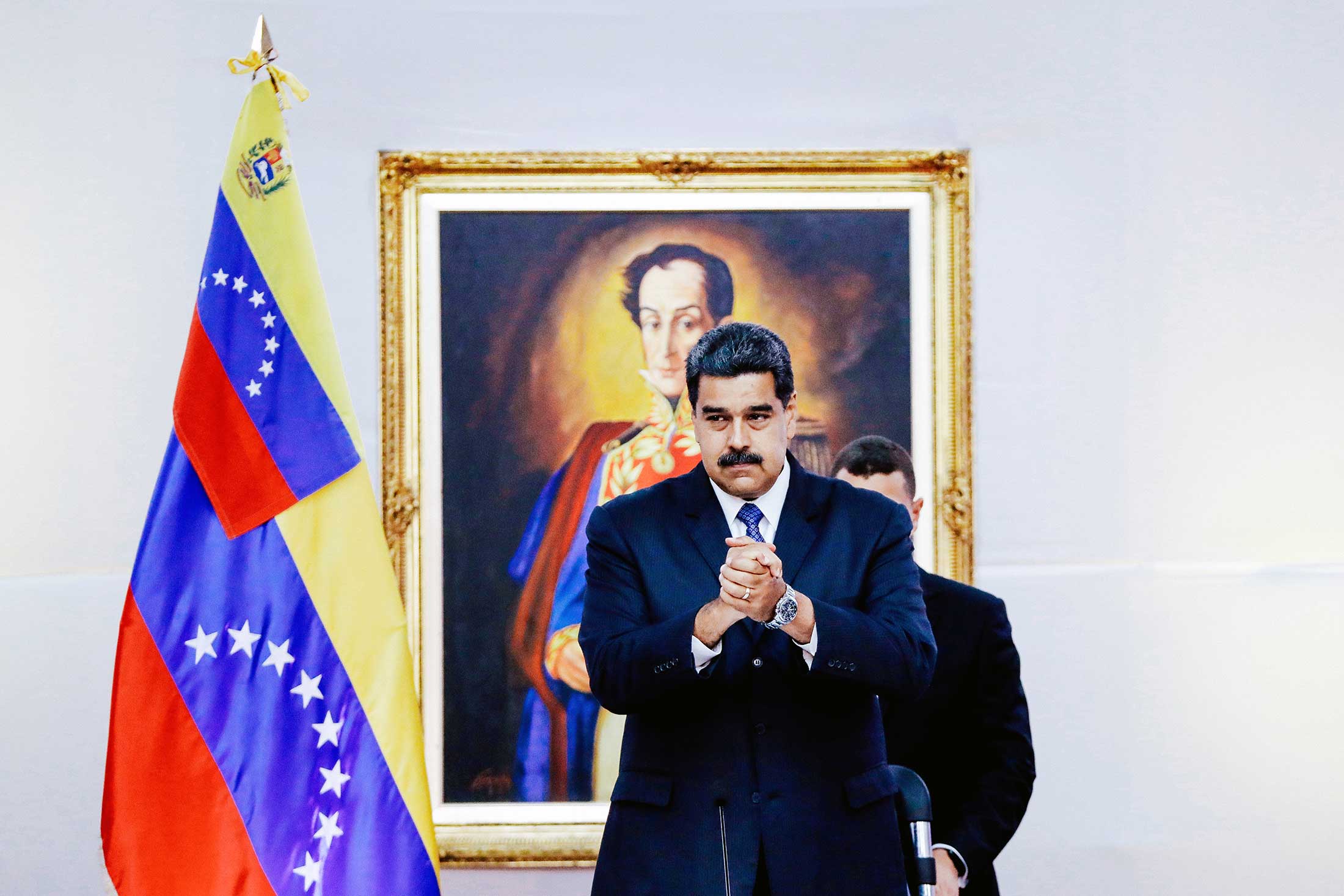 Venezuela President Nicolás Maduro greets international observers for the election at the presidential palace in Caracas, Venezuela, on Friday.