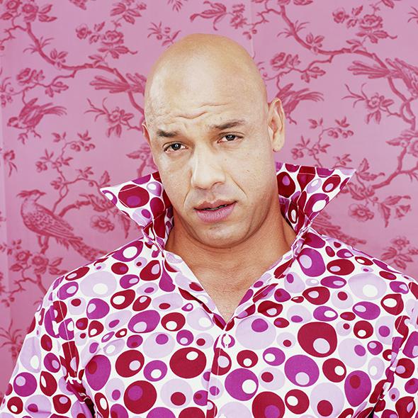 Bald man wearing patterned shirt, portrait
