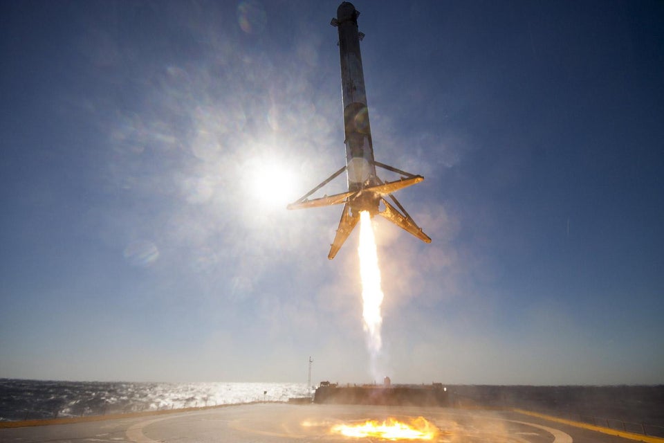 SpaceX photos and video of the Falcon 9 booster landing at sea.