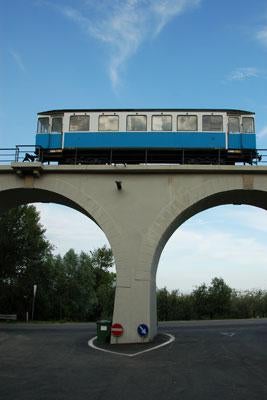 A restored train car memorializes San Marino's defunct railroad. 