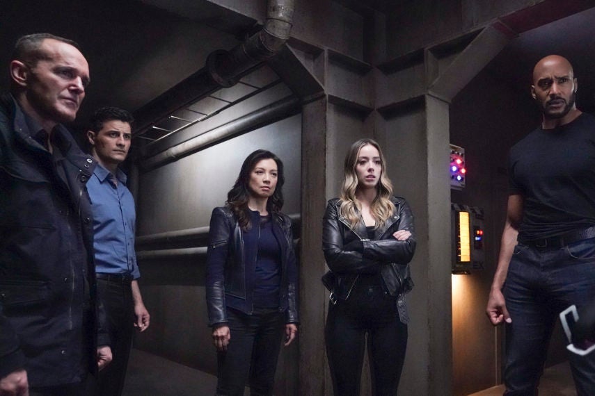 In a still from the show, Clark Gregg, Enver Gjokaj, Ming-Na Wen, Chloe Bennet, and Henry Simmons stand next to one another