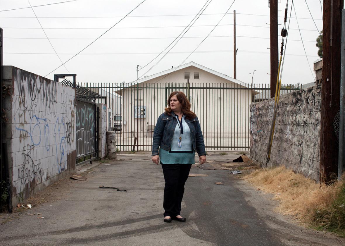 Davis in am alley near her childhood home in South Central L.A.