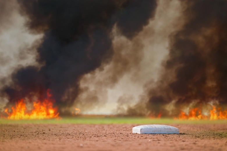 A baseball field on fire.