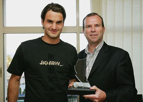 Roger Federer poses with journalist Neil Harman of The Times.