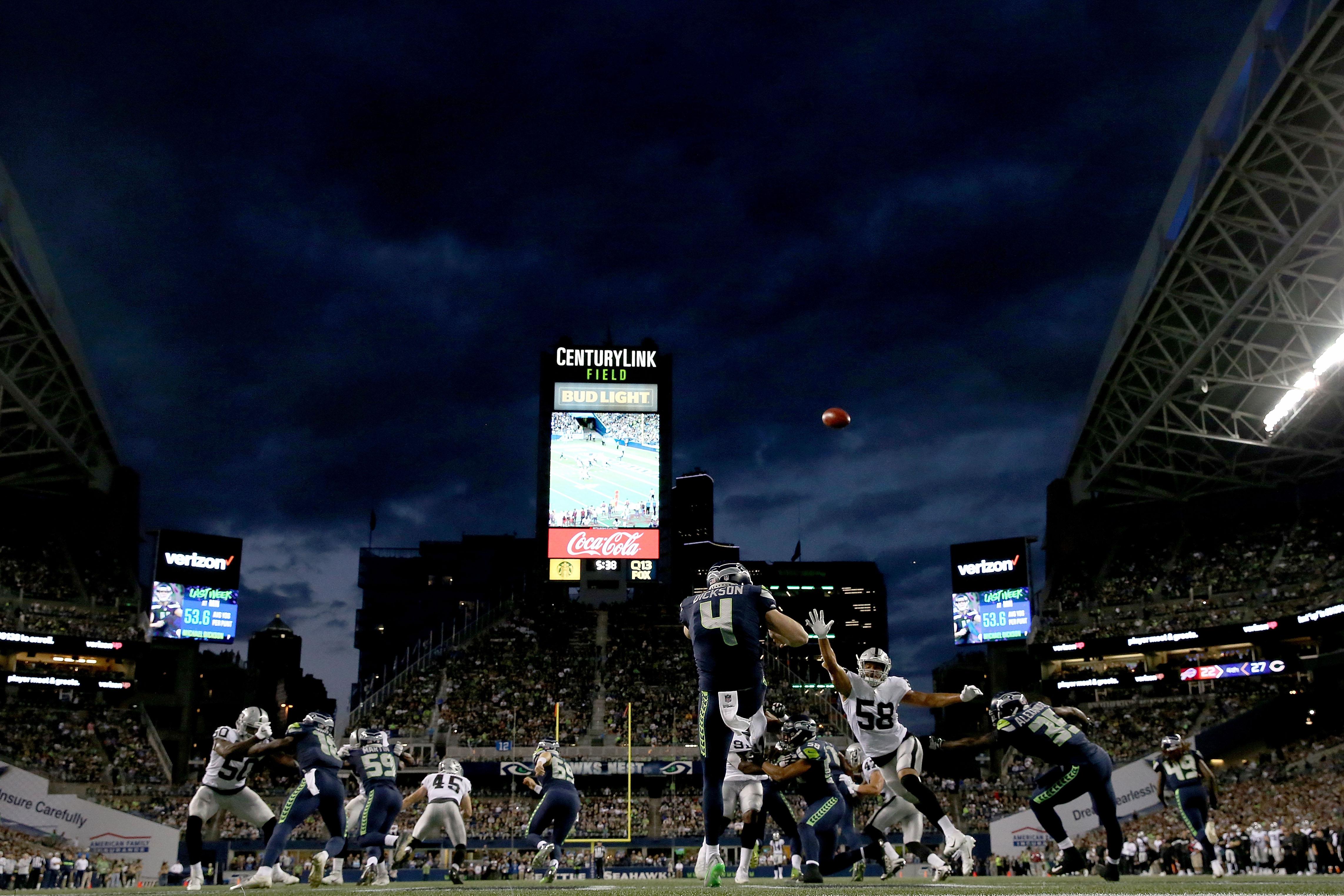 Michael Dickson of the Seattle Seahawks punts the ball during the