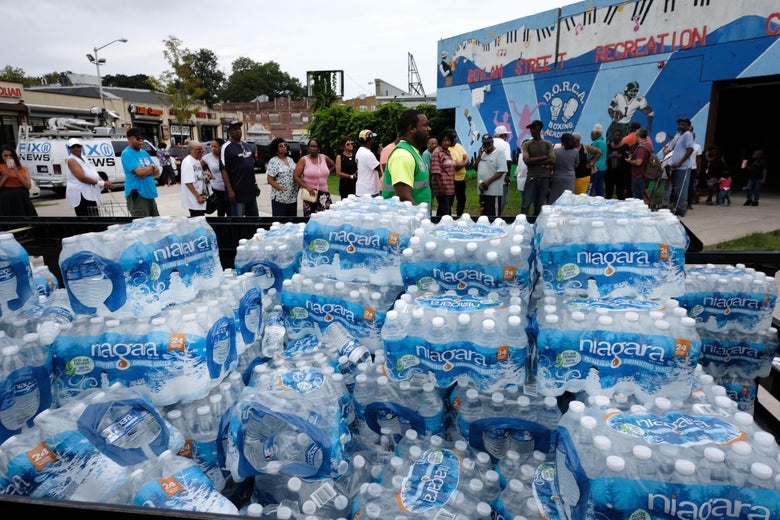 A pallet of bottled water is delivered to a recreation center in Newark.