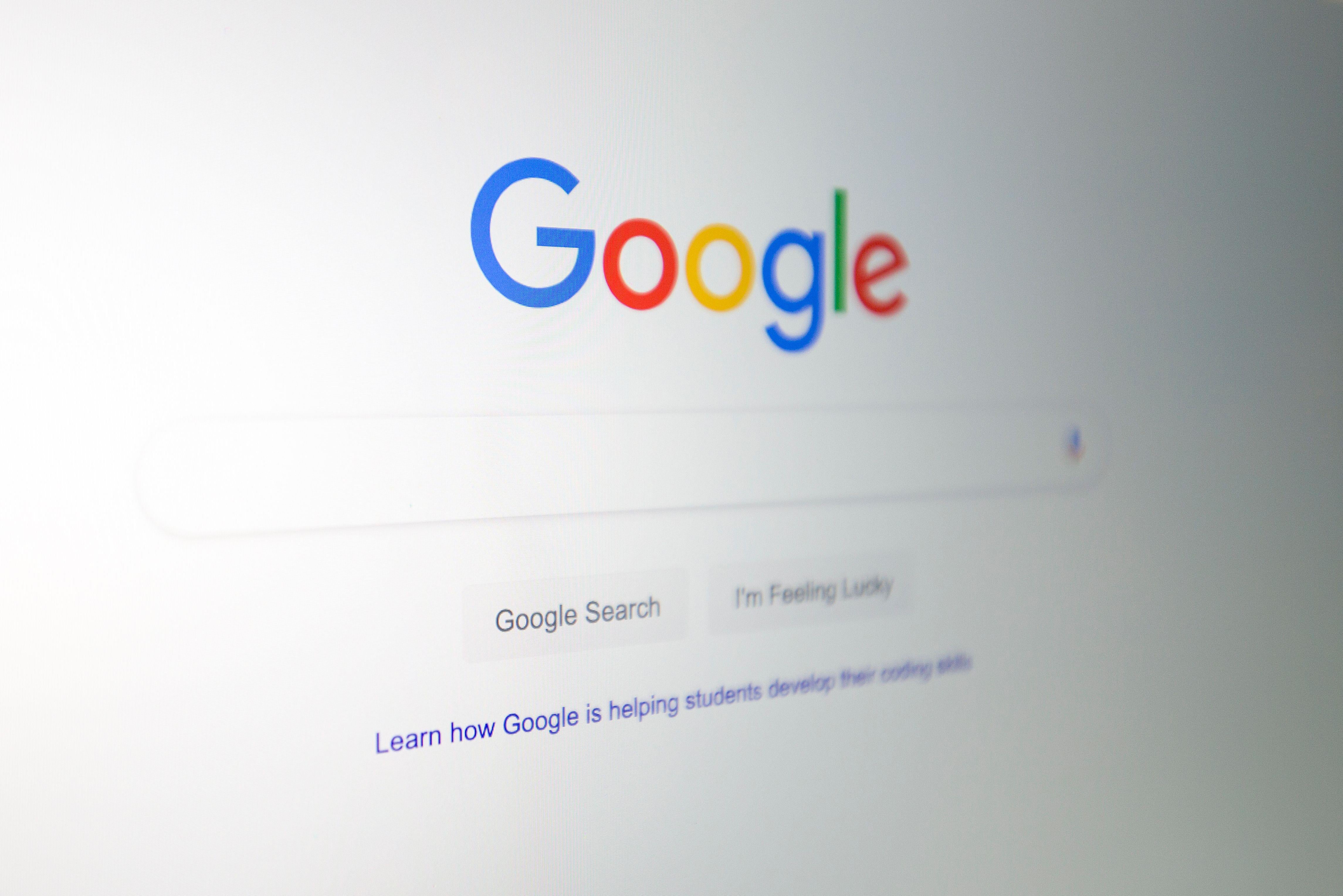 The Google logo is seen on a computer screen in a photo illustration