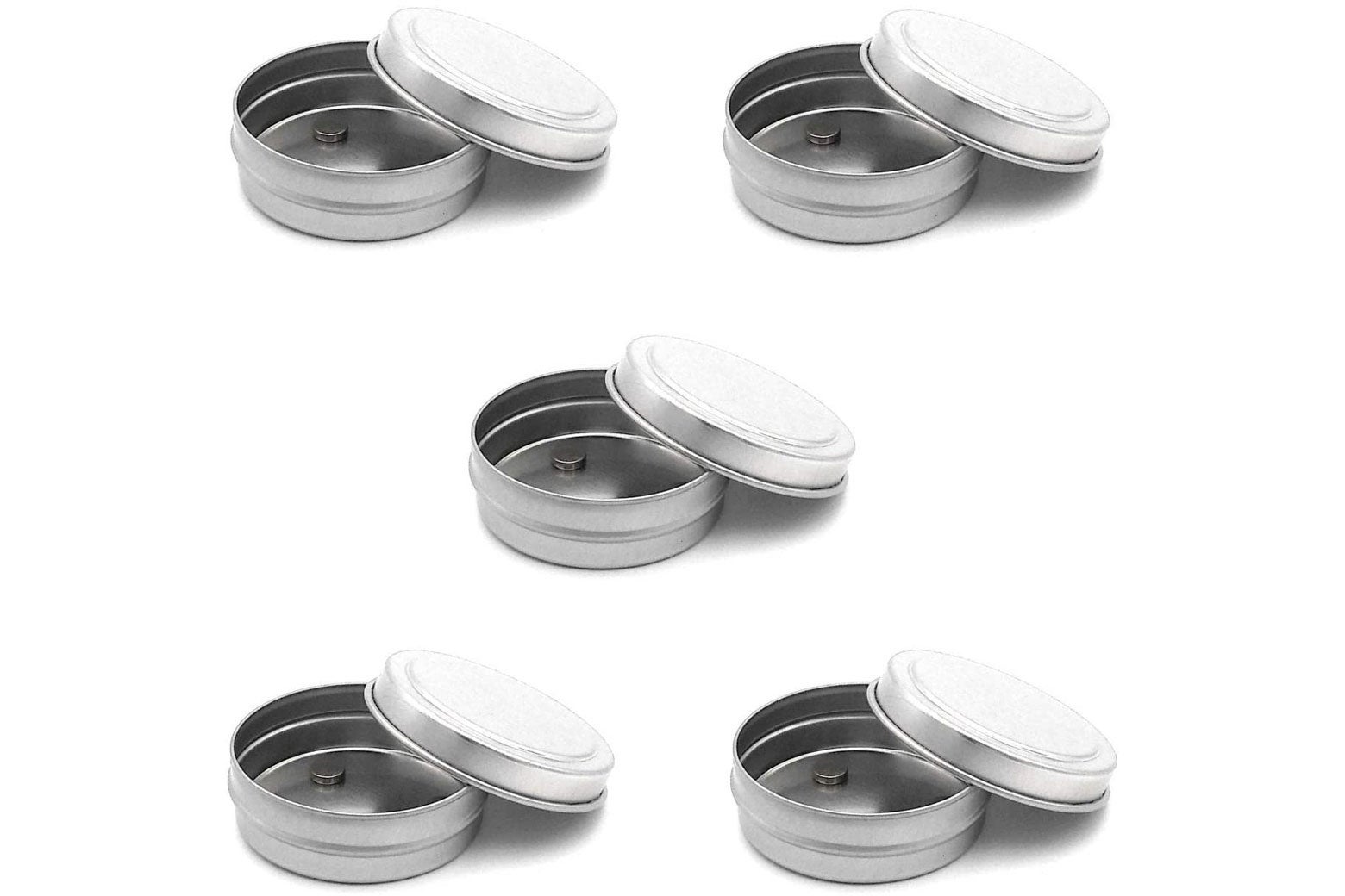 Five round tin containers