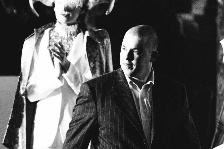 Archival image of Alexander McQueen after being applauded at the end of the presentation of his spring/summer Haute Couture collections on Jan. 19, 1997, in Paris.