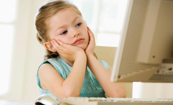 Girl using computer.