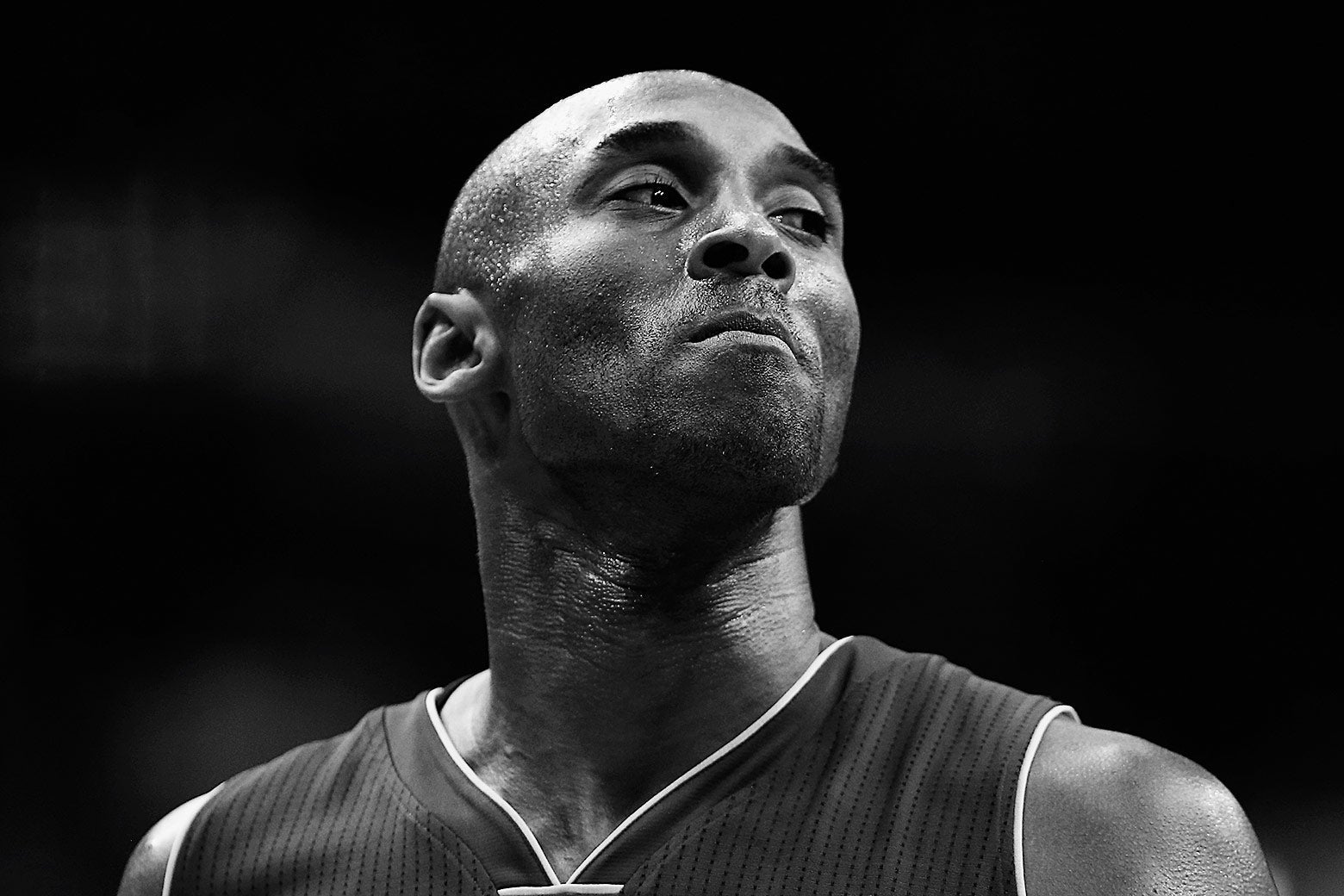 Black-and-white close-up of Kobe Bryant's face as he looks to the side in a Dec. 2, 2015, game against the Washington Wizards.