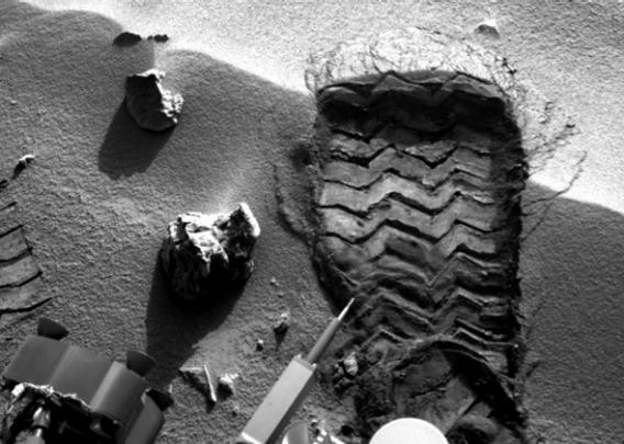 NASA's Mars rover Curiosity cut a wheel scuff mark into a wind-formed ripple at the "Rocknest" site to give researchers a better opportunity to examine the particle-size distribution of the material forming the ripple, on the mission's 57th Martian day, or sol (Oct. 3, 2012).