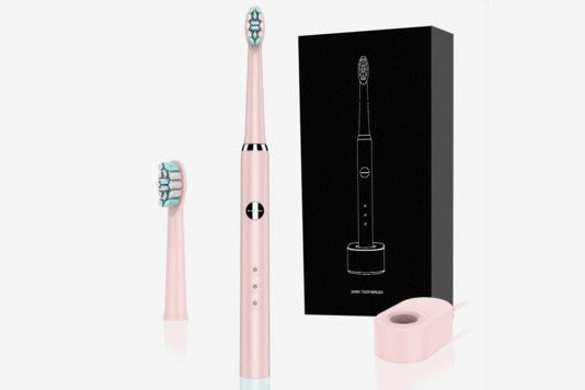 Light pink Shaojier electric toothbrush.