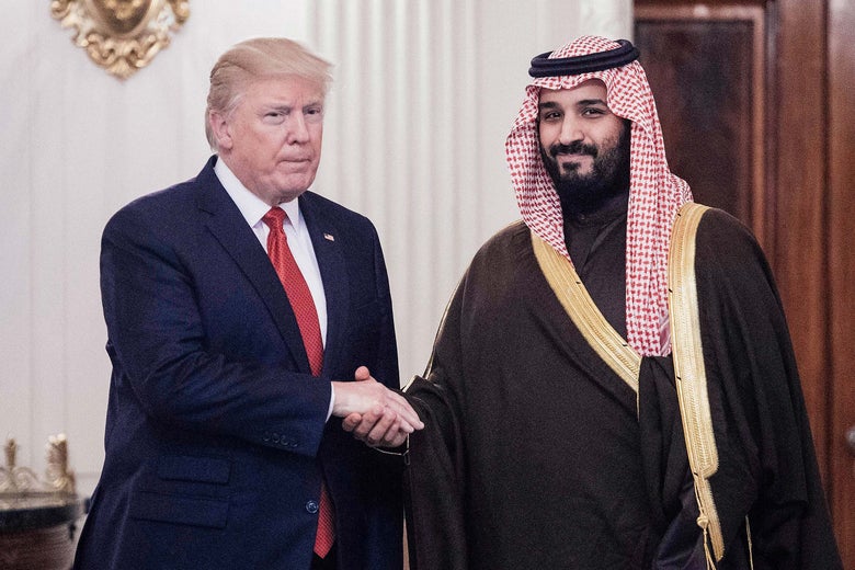 Trump and Crown Prince Mohammed shake hands.