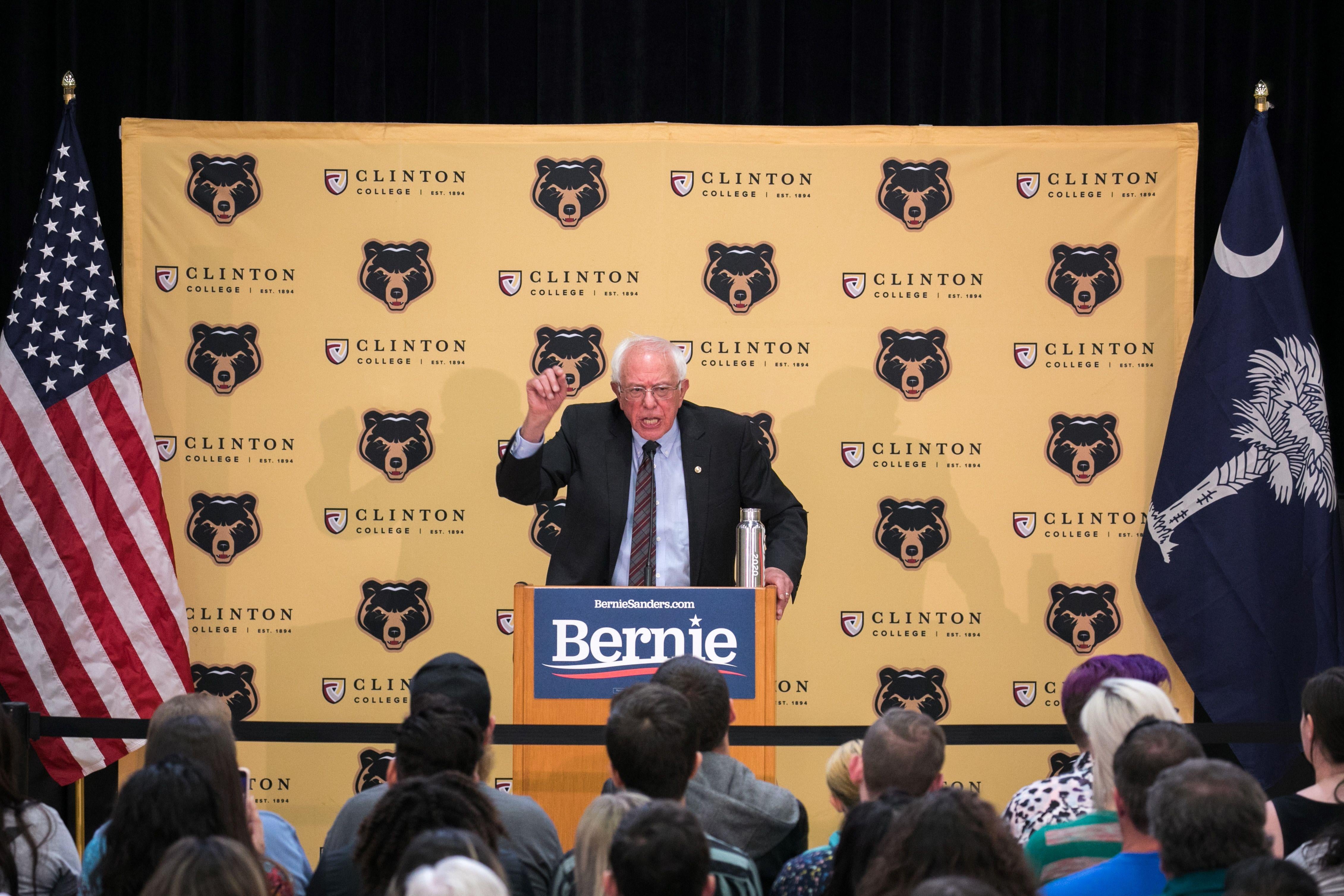 Bernie Sanders addresses the crowd at a packed rally inside the gymnasium at Clinton College.