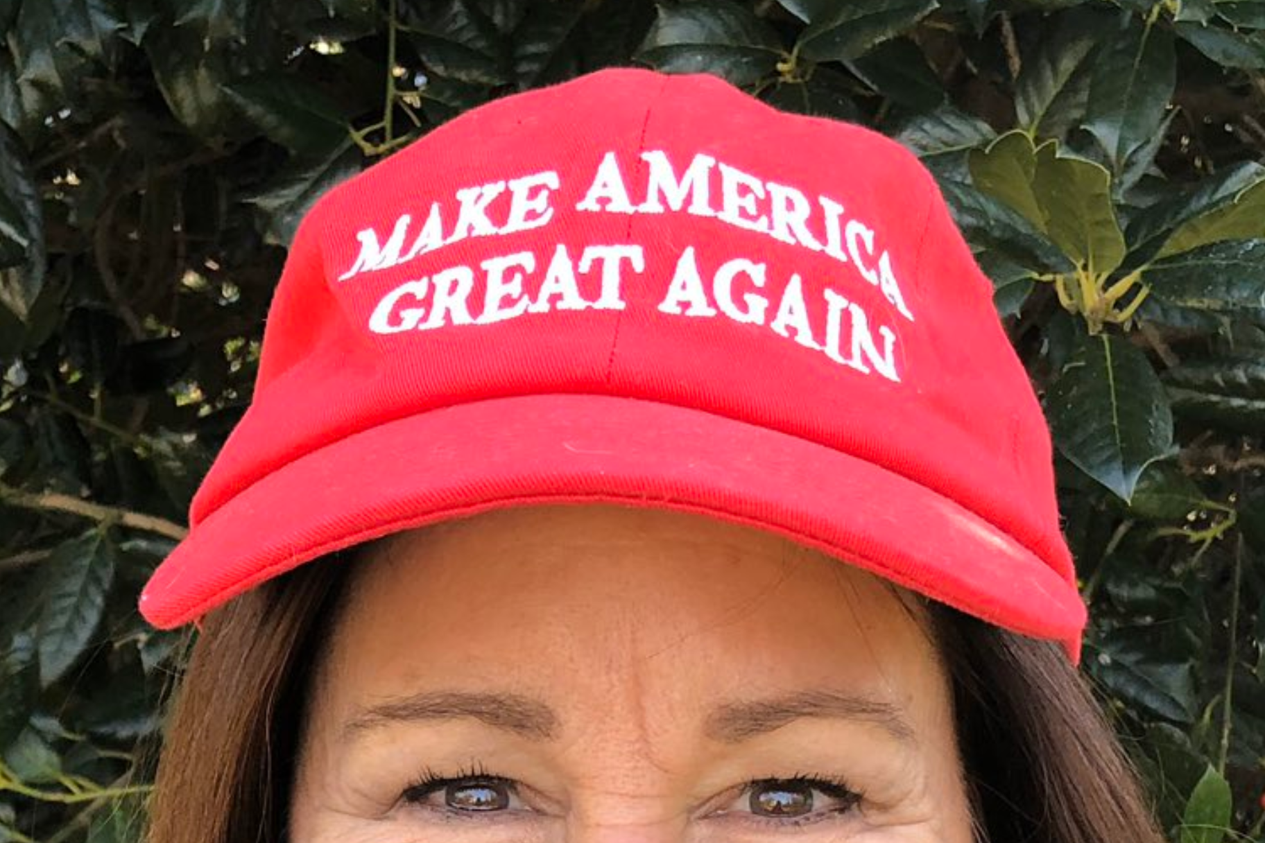 The top of Karen Pence's face is seen, with focus on the MAGA hat she's wearing.