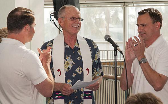 Rev. Dave Sigmund and Jay Graeves becoming legally wed by the Rev. Mel White in Long Beach, California.