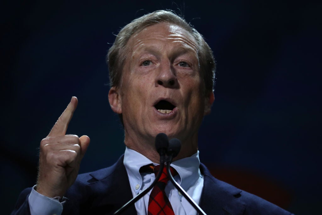 Steyer gestures forcefully while seen in close-up.