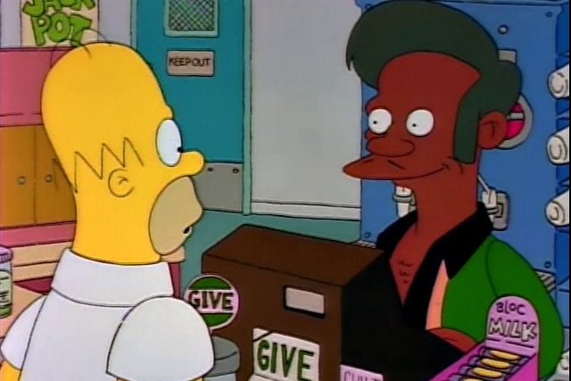 Homer talks to Apu at the cash register of the Kwik-E-Mart on The Simpsons.