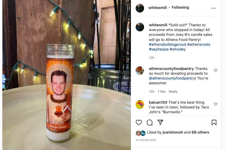 A candle with Joe Burrow's face on it. 