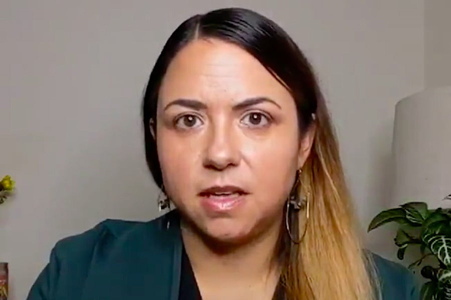 A screengrab of the video, showing Urquiza speaking to the camera.
