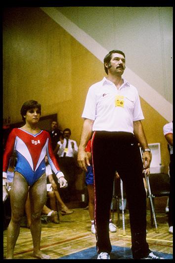 Mary Lou Retton of the United States (left) stands with her coach Bela Karolyi. 