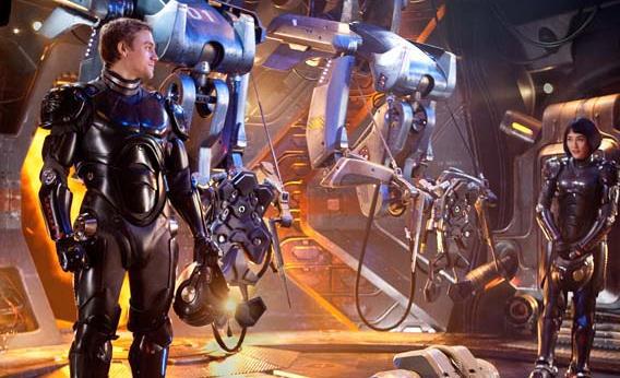 Charlie Hunnam as Raleigh Becket and Rinko Kikuchi as Mako Mori in Warner Bros. Pictures’ and Legendary Pictures’ sci-fi action adventure “Pacific Rim."