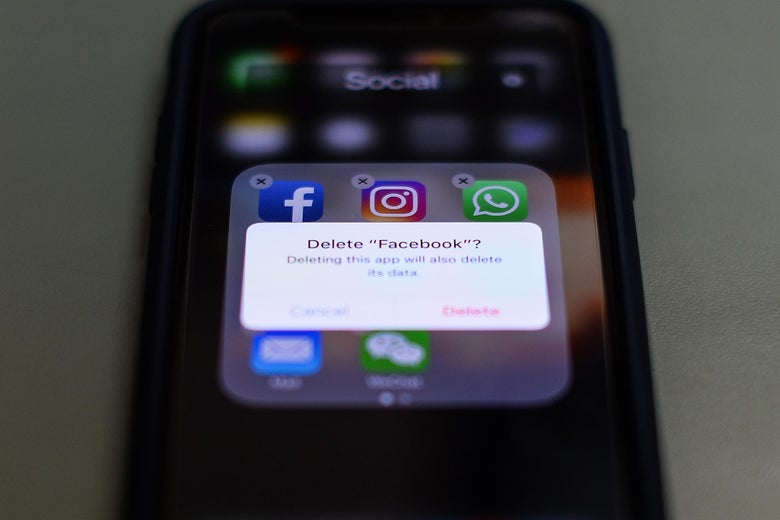 This photo illustration taken on March 27, 2018, shows apps for Facebook, Instagram, Twitter and other social networks on a smartphone in the Indian capital New Delhi. 
India's ruling and main opposition parties on March 26 accused each other of using social media dirty tricks to mine and share followers' personal data. Prime Minister Narendra Modi's Bharatiya Janata Party (BJP) and the Congress party of Rahul Gandhi have seized upon the data breach storm surrounding Facebook and other media to score political points against one another. / AFP PHOTO / CHANDAN KHANNA        (Photo credit should read CHANDAN KHANNA/AFP/Getty Images)