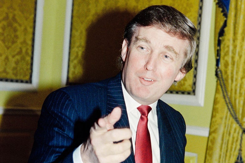 Donald Trump answers questions from reporters about his divorce from his wife Ivana at a news conference in New York on Dec. 11, 1990.