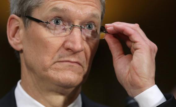 Tim Cook, seen here fiddling with his glasses, thinks most people would prefer to avoid fiddling with their glasses.