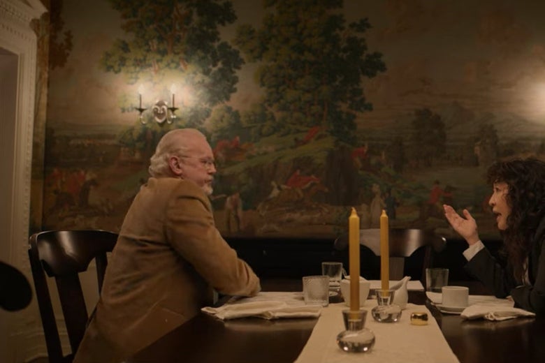 The dean and Dr. Kim sit at his dining room table.