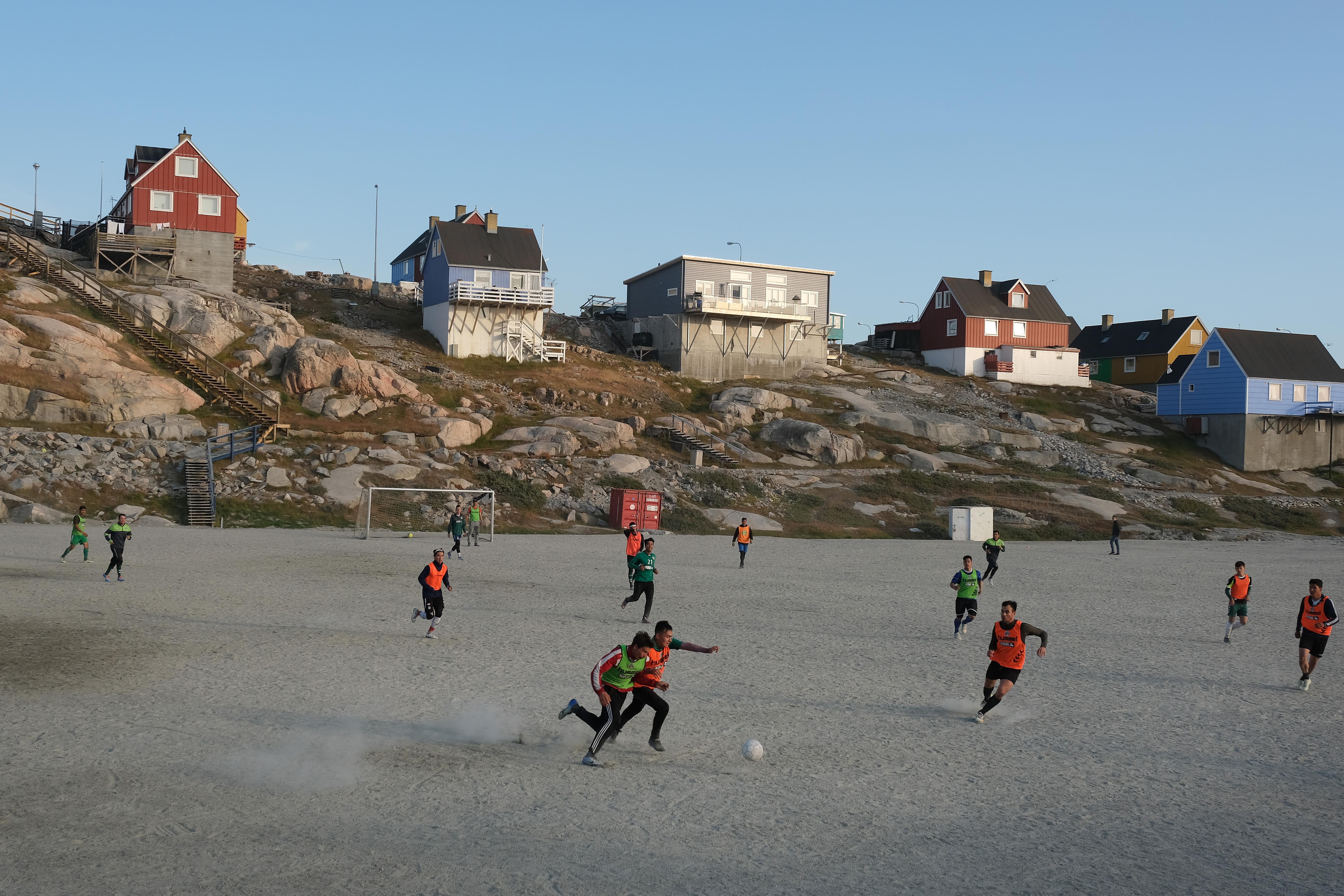 Locals play soccer on a Saturday on August 3, 2019 in Ilulissat, Greenland. 